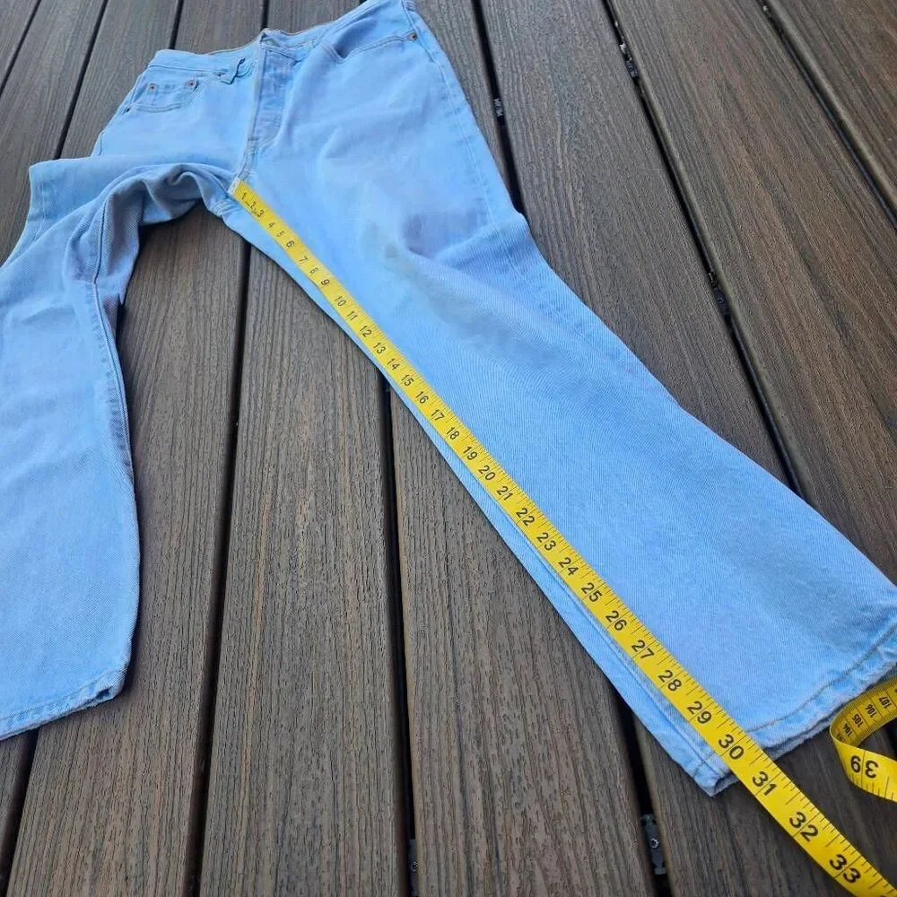 Levi's 501's men's jeans size 29x30 100% cotton light blue wash buttons